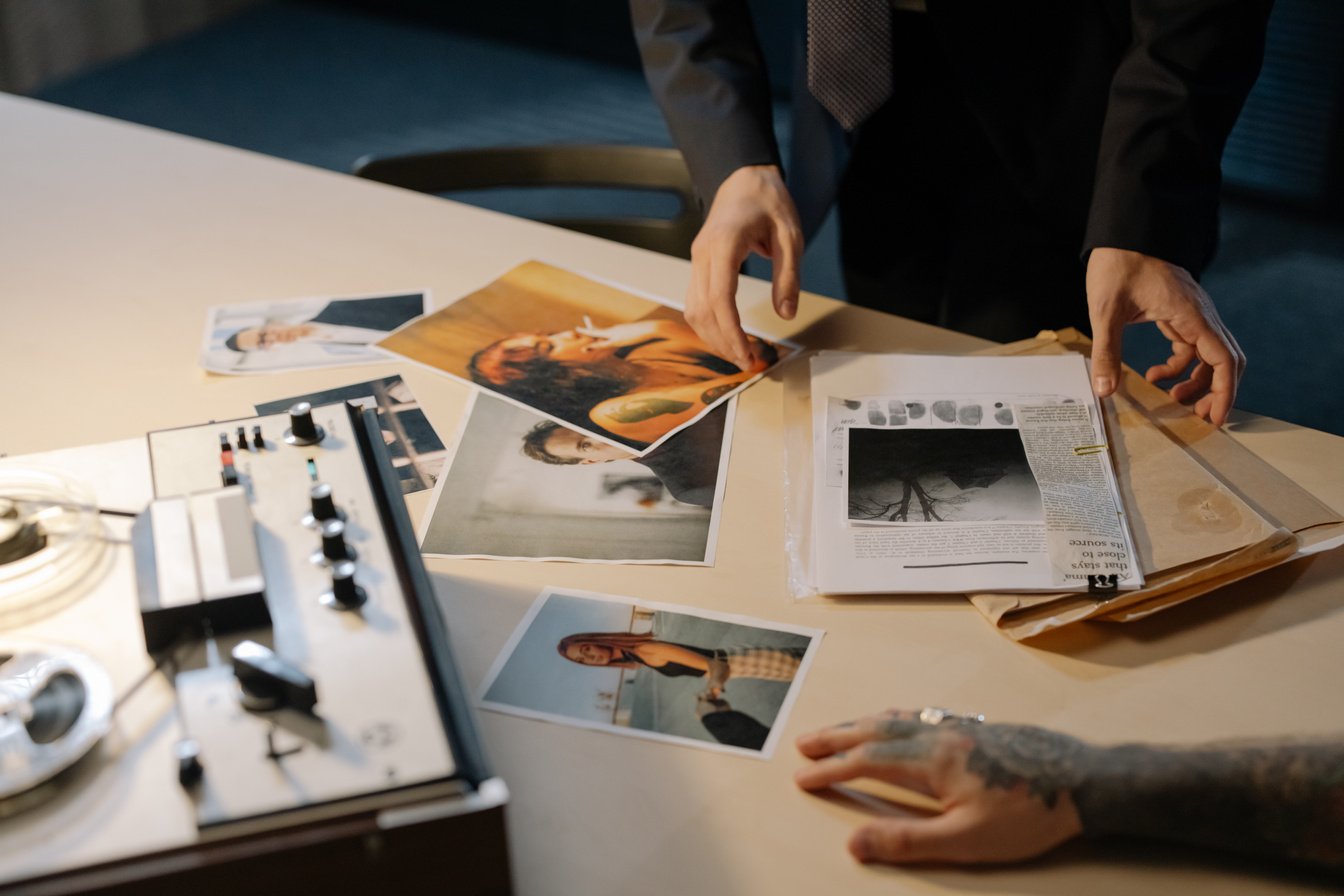 Person Holding White Printer Paper